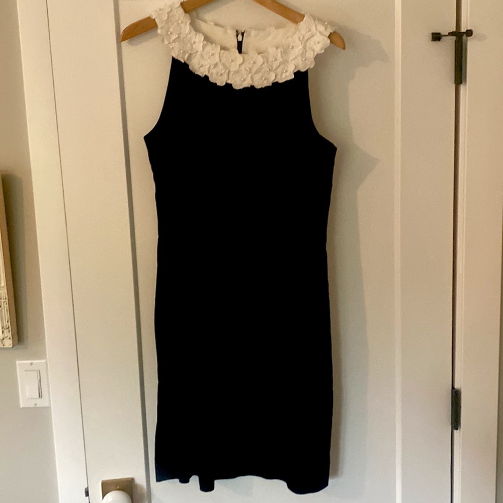 Black women’s dress with Pearl encrusted neckline